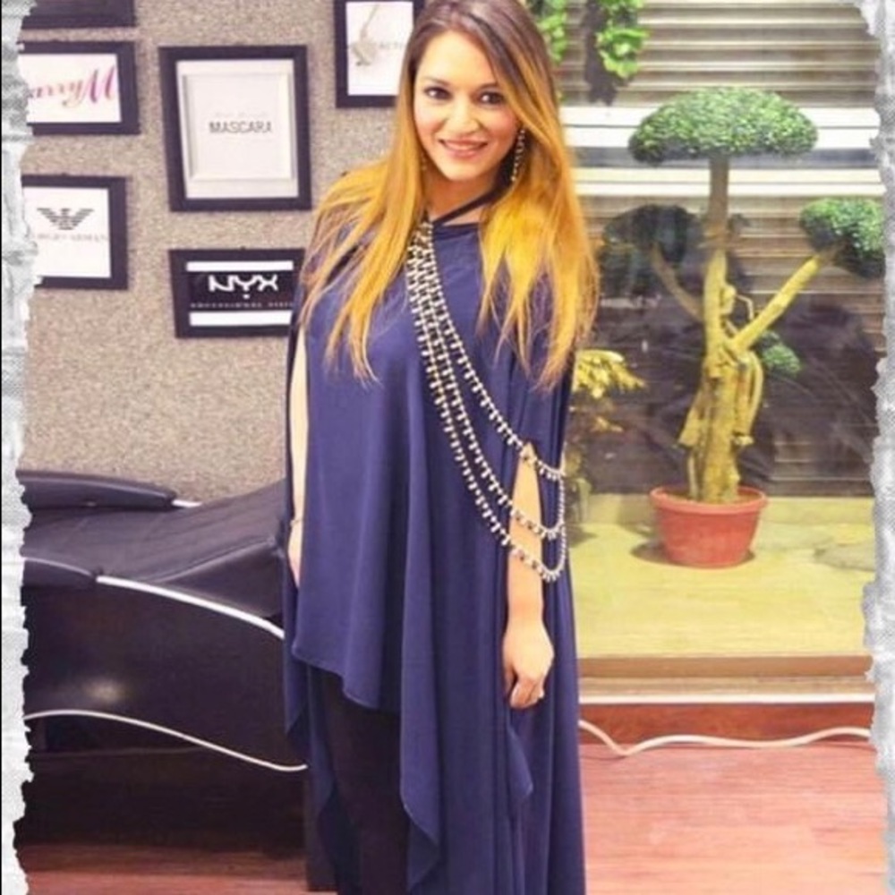 Trendy and chic cape with rhinestones!